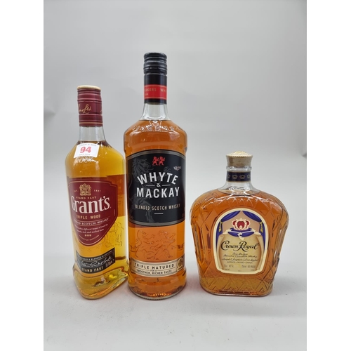 94 - Three bottles of blended Whisky, comprising: a 1 litre Whyte & Mackay; a 70cl Grant's; and a 75c... 