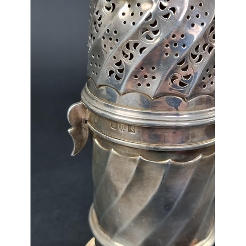 203 - An unusual silver sugar caster, by Charles Stuart Harris, London 1892, 21cm high, 354g.... 