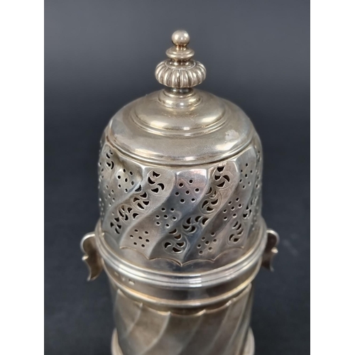 203 - An unusual silver sugar caster, by Charles Stuart Harris, London 1892, 21cm high, 354g.... 