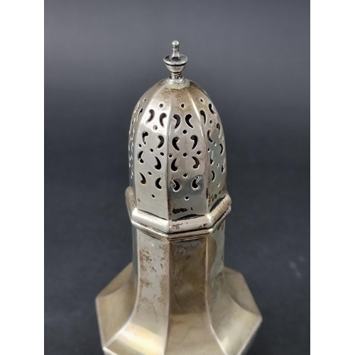 205 - A silver sugar caster, by Walker & Hall, Sheffield 1916, 23cm high, 228g.