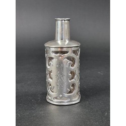 209 - A Continental white metal mounted scent bottle, stamped '800', 12cm high.