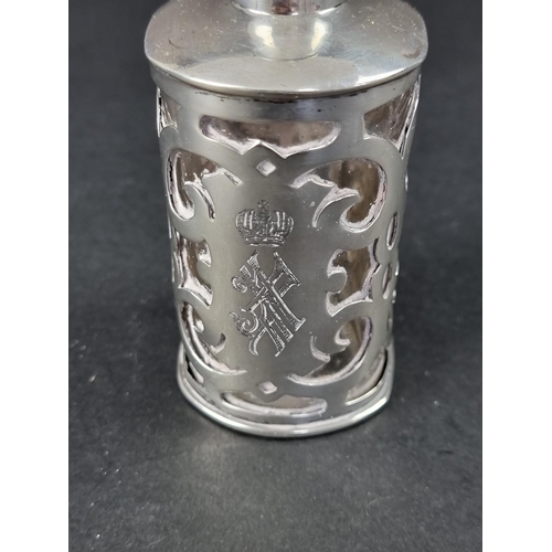 209 - A Continental white metal mounted scent bottle, stamped '800', 12cm high.