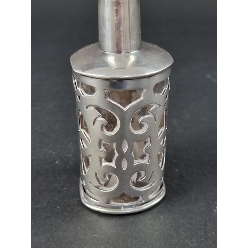 209 - A Continental white metal mounted scent bottle, stamped '800', 12cm high.