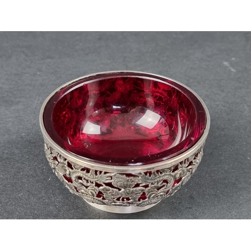 219 - A Chinese pierced white metal bowl, by Wang Hing, Hong Kong, stamped '90', 9cm diameter.... 