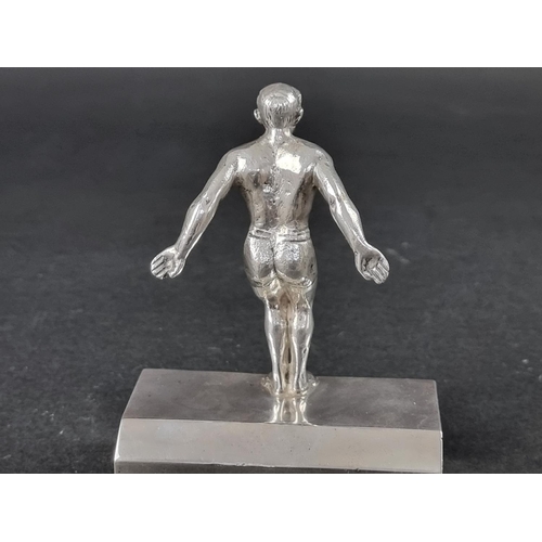222 - A silver swimming trophy, by James Fenton & Co, Birmingham 1954, 11.5cm high, 236g.... 
