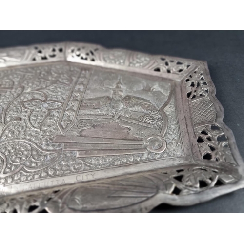 228 - An Indian white metal tray, stamped 'T94', 35cm wide.