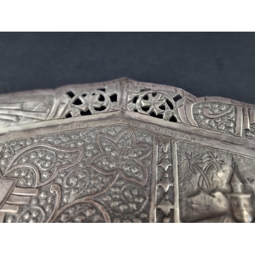 228 - An Indian white metal tray, stamped 'T94', 35cm wide.