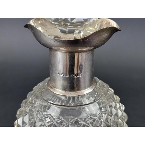 236 - A late Victorian silver mounted cut glass thistle decanter and stopper, by Saunders & Hollings, ... 