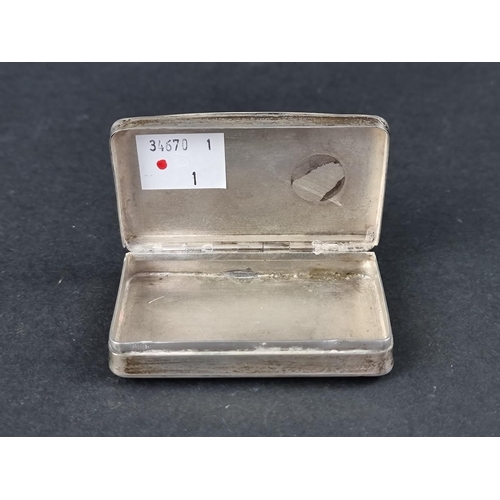 244 - A continental white metal snuff box, 7.5cm wide.