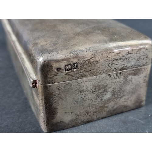 249 - A silver cigarette box, by Charles & Richard Comyns, London 1916, engraved 'Presented to the Ser... 