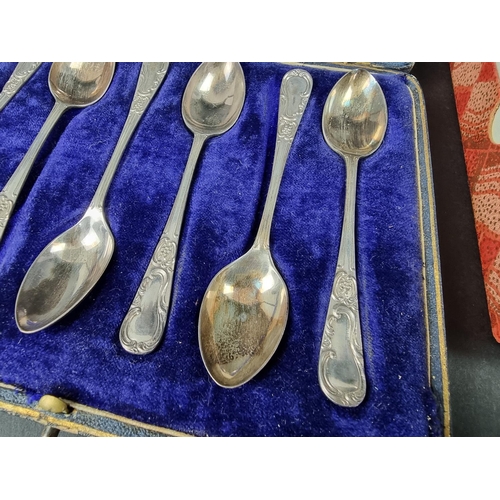 258 - A cased set of six silver teaspoons, by Robert Pringle & Sons, Sheffield 1910; together with ano... 