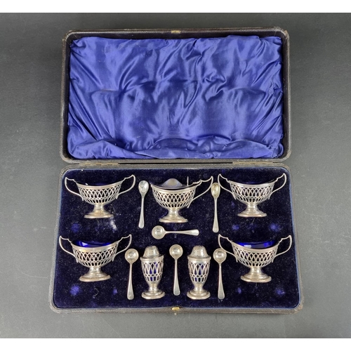 262 - A case containing a Victorian silver double condiment set, mostly by Faraday & Davey, London 190... 