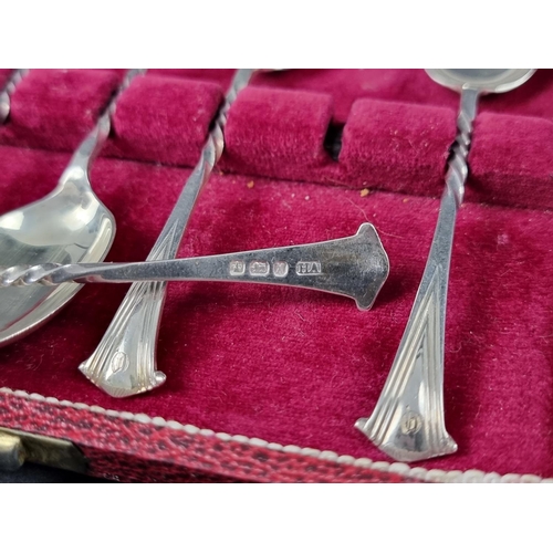 266 - A cased set of six Victorian silver coffee spoons, by Atkin Brothers, Sheffield 1890, 80g.... 