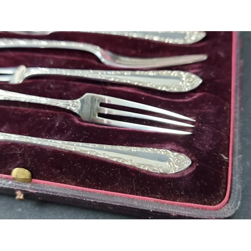 268 - A cased set of six Edwardian silver cake forks, by James Dixon & Sons Ltd, Sheffield 1904, 73g.... 