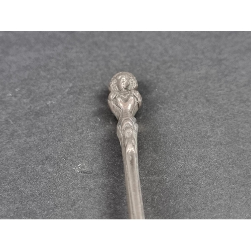 273 - A Dutch .833 standard 'apostle top' spoon, 17.8cm; together with another similar example. (2)... 