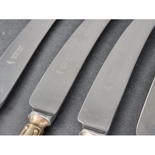 278 - A set of eight EPNS Dubarry pattern table knives and matching dessert knives, by John Osborne of She... 