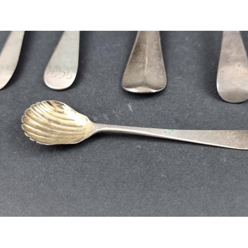 282 - A George II silver mote spoon, 14.5cm; together with five other various silver spoons, weighable 103... 