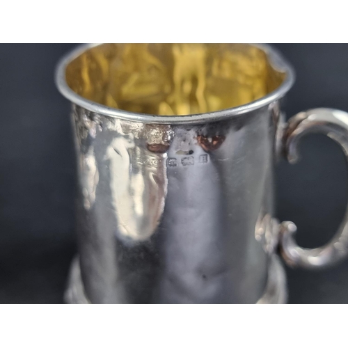 293 - An Edwardian silver twin handled cup, by Walker & Hall, Sheffield 1909, 8cm high; together with ... 