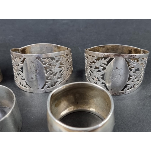 294 - Eight various silver napkin rings, 185g.