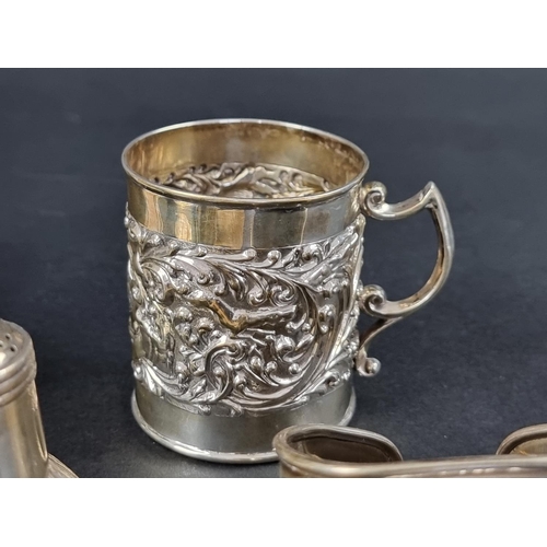 296 - A silver Christening mug, by Crisford & Norris Ltd, Birmingham, 6cm high; together with eight ot... 