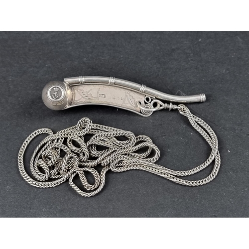 306 - A silver bosun's whistle, by George Unite, Birmingham 1957, 10.5cm long, on a white metal lanyard, g... 