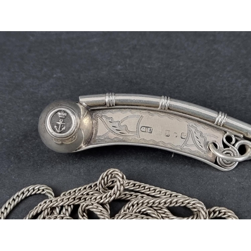 306 - A silver bosun's whistle, by George Unite, Birmingham 1957, 10.5cm long, on a white metal lanyard, g... 