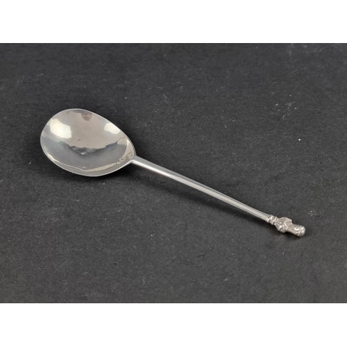 316 - A 17th or 18th century white metal apostle spoon, with maker's mark stamped to bowl and two pairs of... 