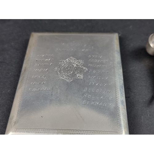 320 - An interesting white metal RASC cigarette case, inscribed 'September 1939-45', 11.5cm long; together... 