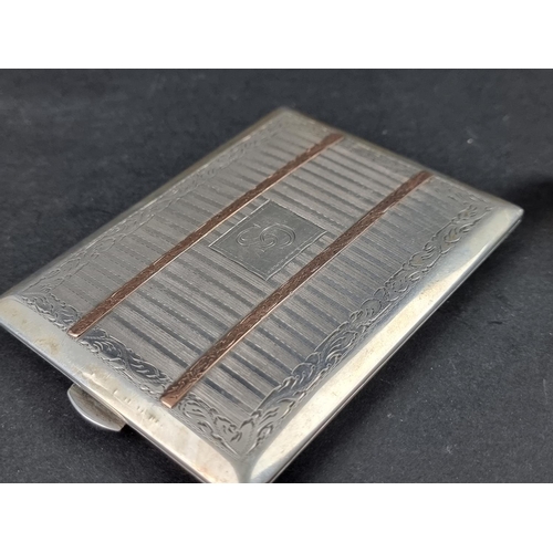 320 - An interesting white metal RASC cigarette case, inscribed 'September 1939-45', 11.5cm long; together... 