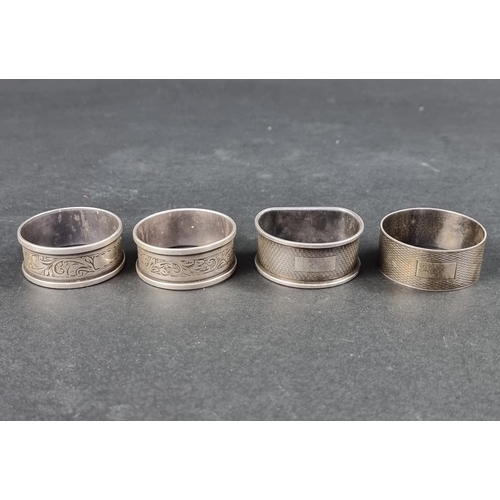 322 - A pair of silver napkin rings, by Henry Griffith & Sons Ltd, Birmingham 1948/9; together with tw... 