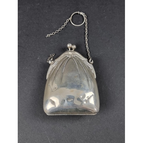 324 - A silver purse, maker's mark rubbed, probably Birmingham 1908, gross weight 67g.