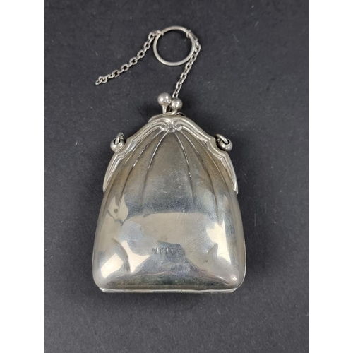 324 - A silver purse, maker's mark rubbed, probably Birmingham 1908, gross weight 67g.