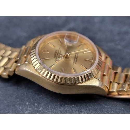 636 - A Rolex 'Oyster Perpetual Datejust' 18ct gold ladies wristwatch, 25mm, Ref. 69178, on original 18ct ... 