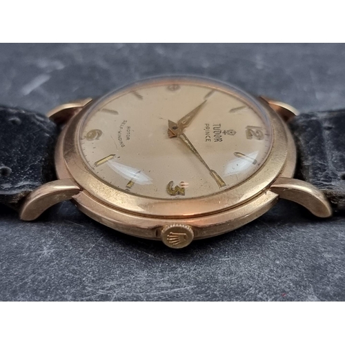 639 - A 1950s Tudor 'Prince' 9ct gold automatic wristwatch, 35mm, on later black leather strap.... 