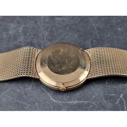 641 - A vintage Omega 'De Ville' 9ct gold manual wind wristwatch, 33mm, on 9ct gold Omega Milanese bracele... 