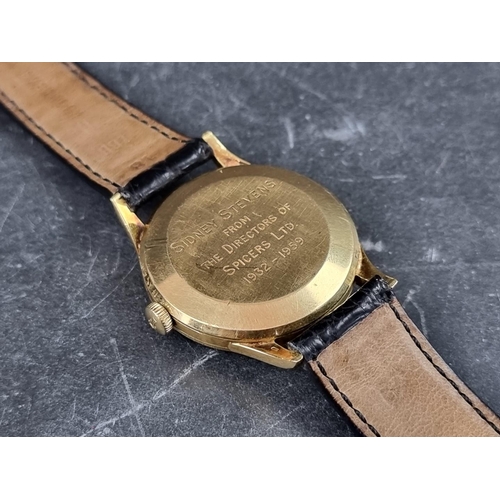 658 - A early 1960s IWC 18ct gold manual wind wristwatch, 33mm, on vintage Omega black leather strap.... 