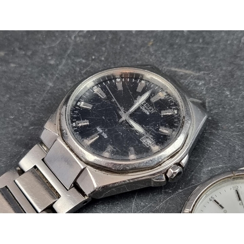 675 - A Seiko stainless steel quartz wristwatch, 35mm, Ref. 7N43-8200, together with a Citizen 'Eco-Drive'... 