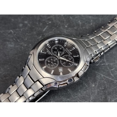 686 - A Citizen 'Eco-Drive' stainless steel chronograph wristwatch, 40mm, Ref. H500-S063418, on original s... 