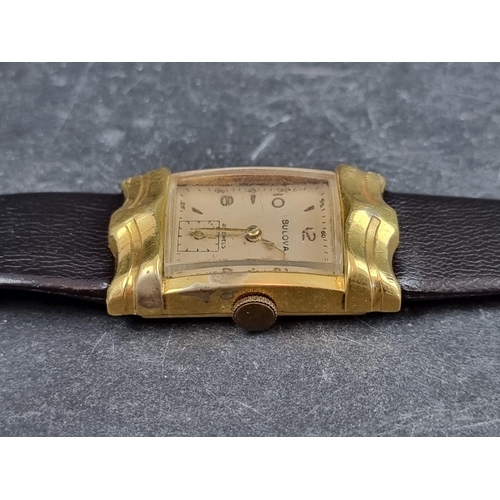 697 - A 1950s Art Deco style Bulova gold plated manual wind wristwatch, 22 x 37mm, on vintage black leathe... 