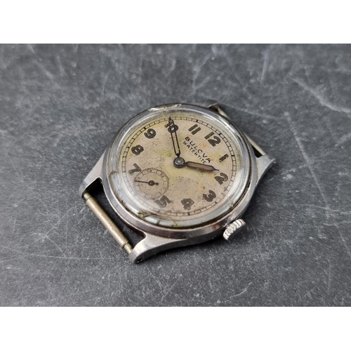 699 - A 1930s Bulova stainless steel manual wind wristwatch, 29mm, (lacking strap).