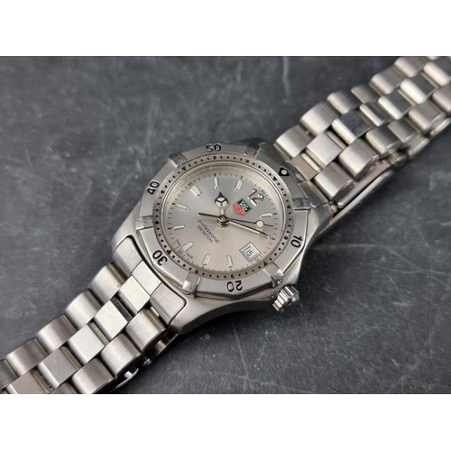 703 - A Tag Heuer 'Professional' 2000 series WK1312 stainless steel quartz ladies wristwatch, 28mm.... 