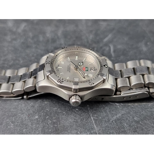 703 - A Tag Heuer 'Professional' 2000 series WK1312 stainless steel quartz ladies wristwatch, 28mm.... 