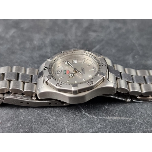 703 - A Tag Heuer 'Professional' 2000 series WK1312 stainless steel quartz ladies wristwatch, 28mm.... 