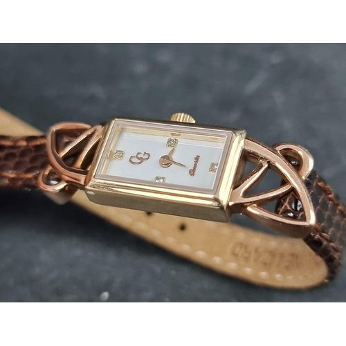 705 - A Clogau 9ct gold quartz ladies wristwatch, 11mm, on original leather strap, boxed.