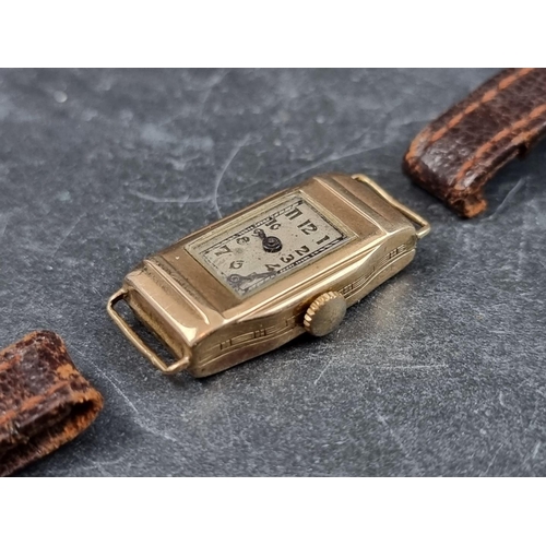 710 - A circa 1930s 9ct gold manual wind ladies wristwatch, 14mm, with brown leather strap.... 