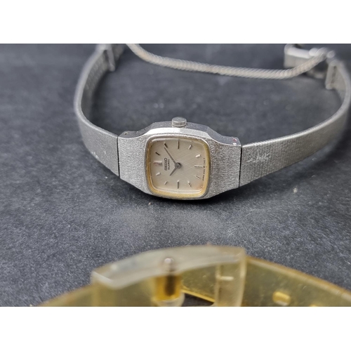 716 - A vintage Gubelin 18ct gold manual wind ladies wristwatch, on 9ct gold bracelet; together with three... 