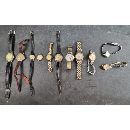 719 - A group of ladies wristwatches, to include a 9ct gold Omega and a 9ct gold Kered. (11)... 