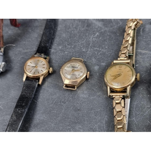 719 - A group of ladies wristwatches, to include a 9ct gold Omega and a 9ct gold Kered. (11)... 