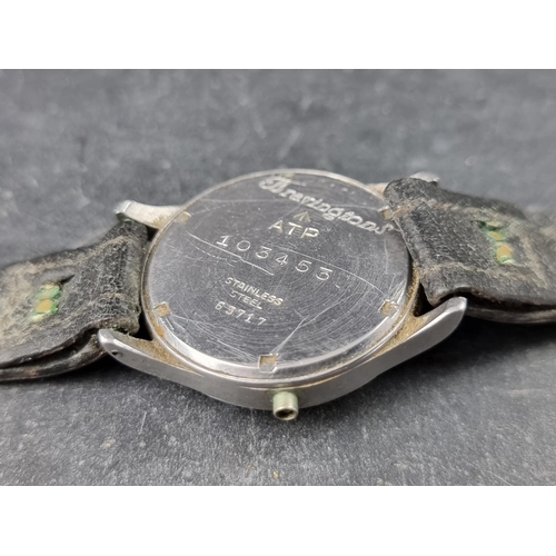 727 - A Unitas ATP military wristwatch, the case back stamped Bravingtons and numbered 103453, on black le... 