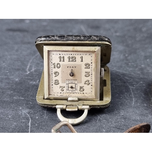 728 - A Swiss WWI trench watch, having unsigned white enamel dial with luminous Arabic markers, 34mm, the ... 